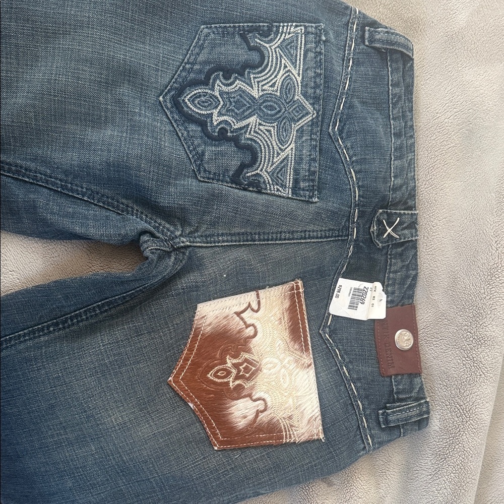 Antik denim woman’s Distressed Blue Jeans with Embroidered Back Pockets